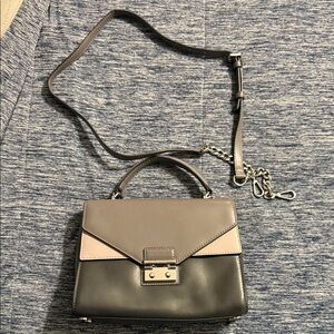 Michael Kors Gray and Black Women's Handbag
Cross body or top handle 
Used once